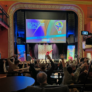 Audience participation at the Majestic Theater featuring Guy Thorne, UW Division of the Arts, Arts Residency Programs Coordinator.